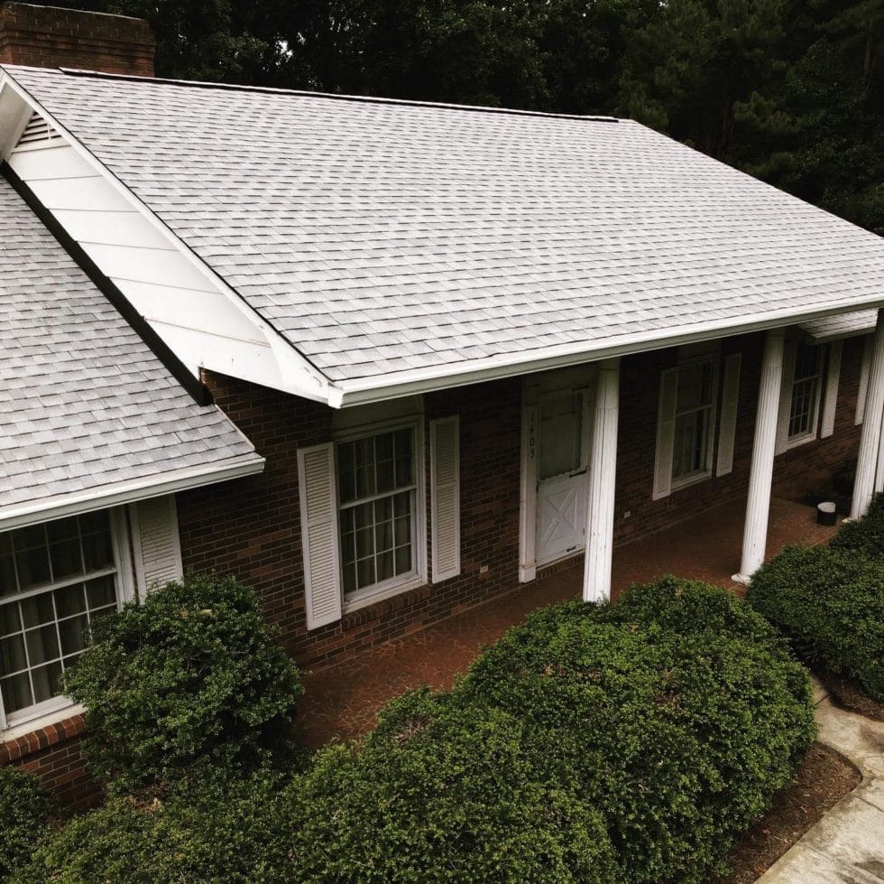 House with a gray shingle roof