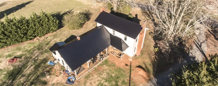 Aerial view of house with roof