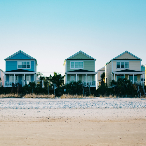 Three beach houses by the shore