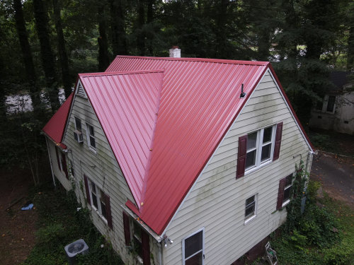 Deals Metals in Statesville-RUSTIC RED, CLASSIC RIB METAL ROOF