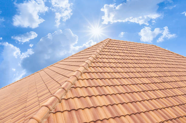Sunny sky over tiled roof
