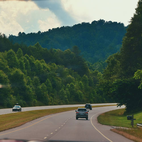 Cars driving on a winding road