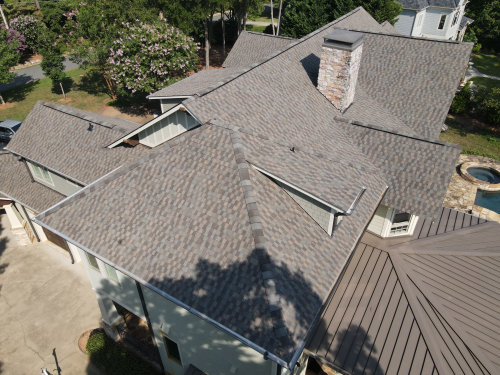 We're thrilled to showcase one of our latest projects in beautiful Cornelius, North Carolina. Just look at this stunning transformation! Our expert team at Providence Roofs has worked tirelessly to give this home the protection and curb appeal it deserves. With our top-notch materials from @gafroofing and skilled craftsmanship, we've ensured that this roof is not only durable but also a real showstopper. But it's not just about aesthetics – a new roof means peace of mind for the homeowners. It's ready to take on the elements, ensuring their family stays safe and dry for years to come. Whether you're in Cornelius or anywhere in the Charlotte area, we're here to make your roofing dreams a reality. Contact us today for a free consultation, and let's discuss how we can elevate your home's look and protection!
